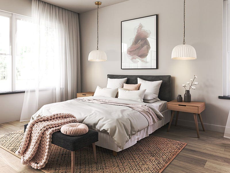 Chambre moderne avec deux plafonniers pendants au-dessus des tables de nuit