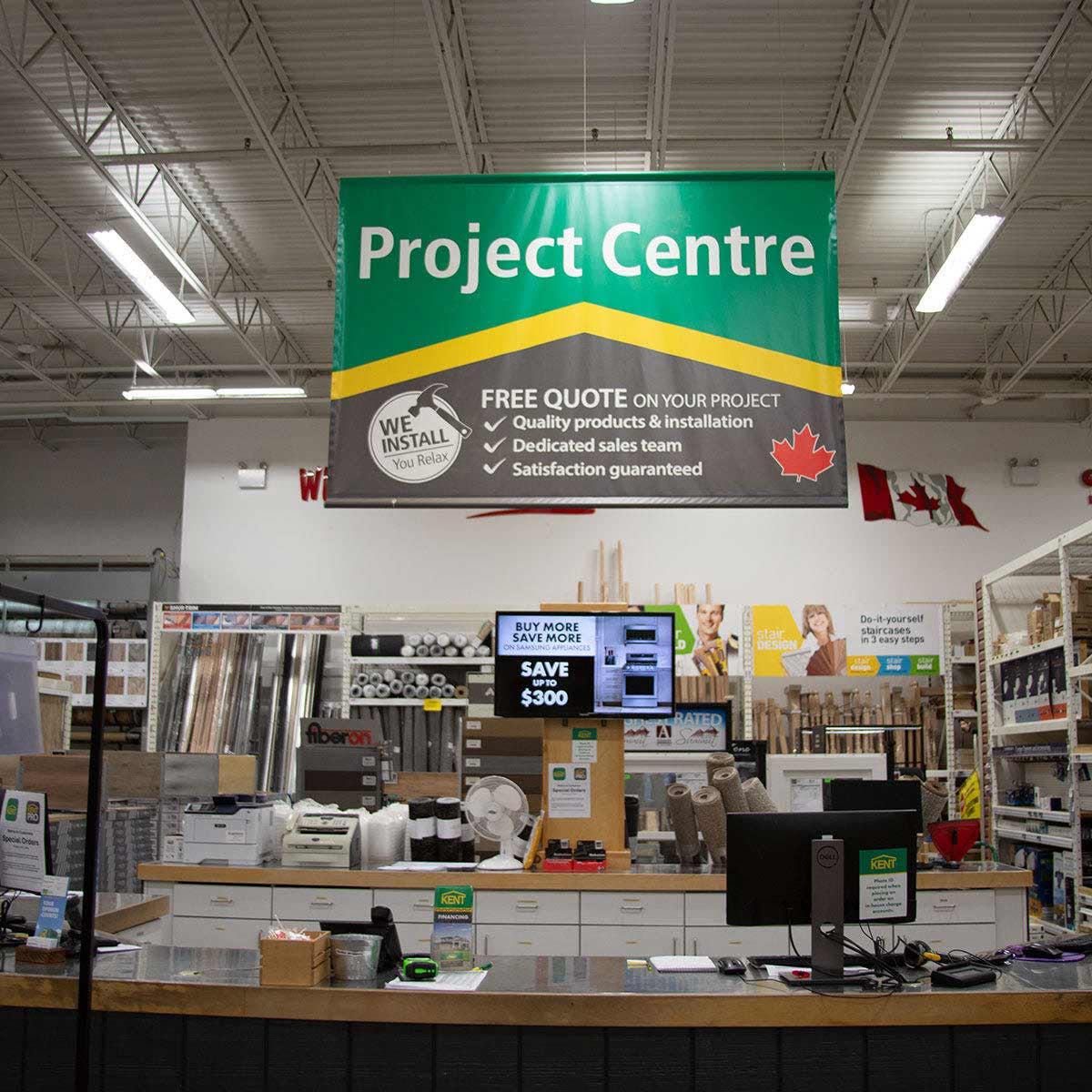 Project Centre desk inside a hardware store with signage offering free quotes, product selection, and installation services image